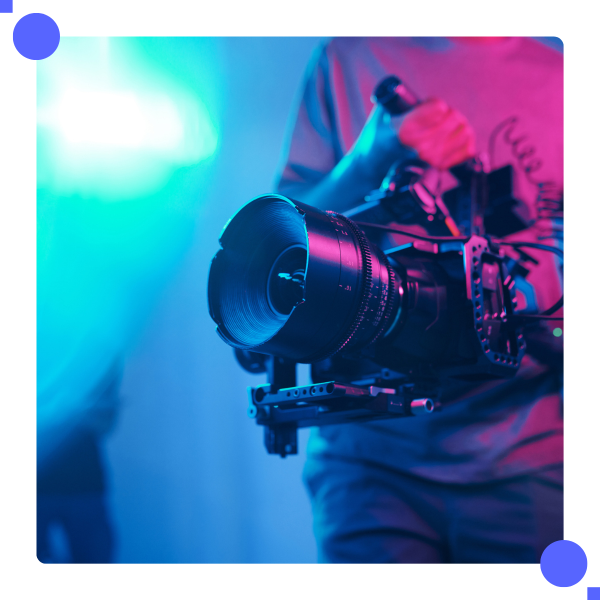 Videographer holding a camera